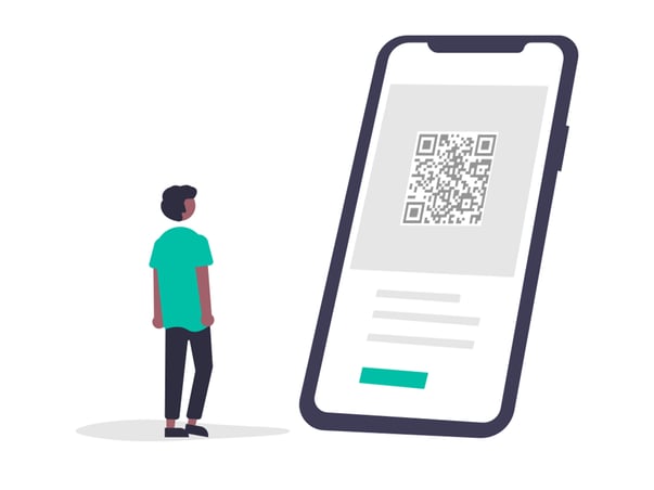 電子チケットを表示したスマートフォンを見つめる人物